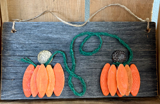 Pumpkins orange on long board